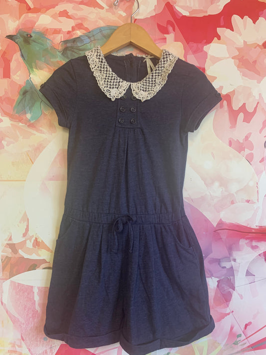 Next blue short sleeve romper with white embroidery collar. Size 6