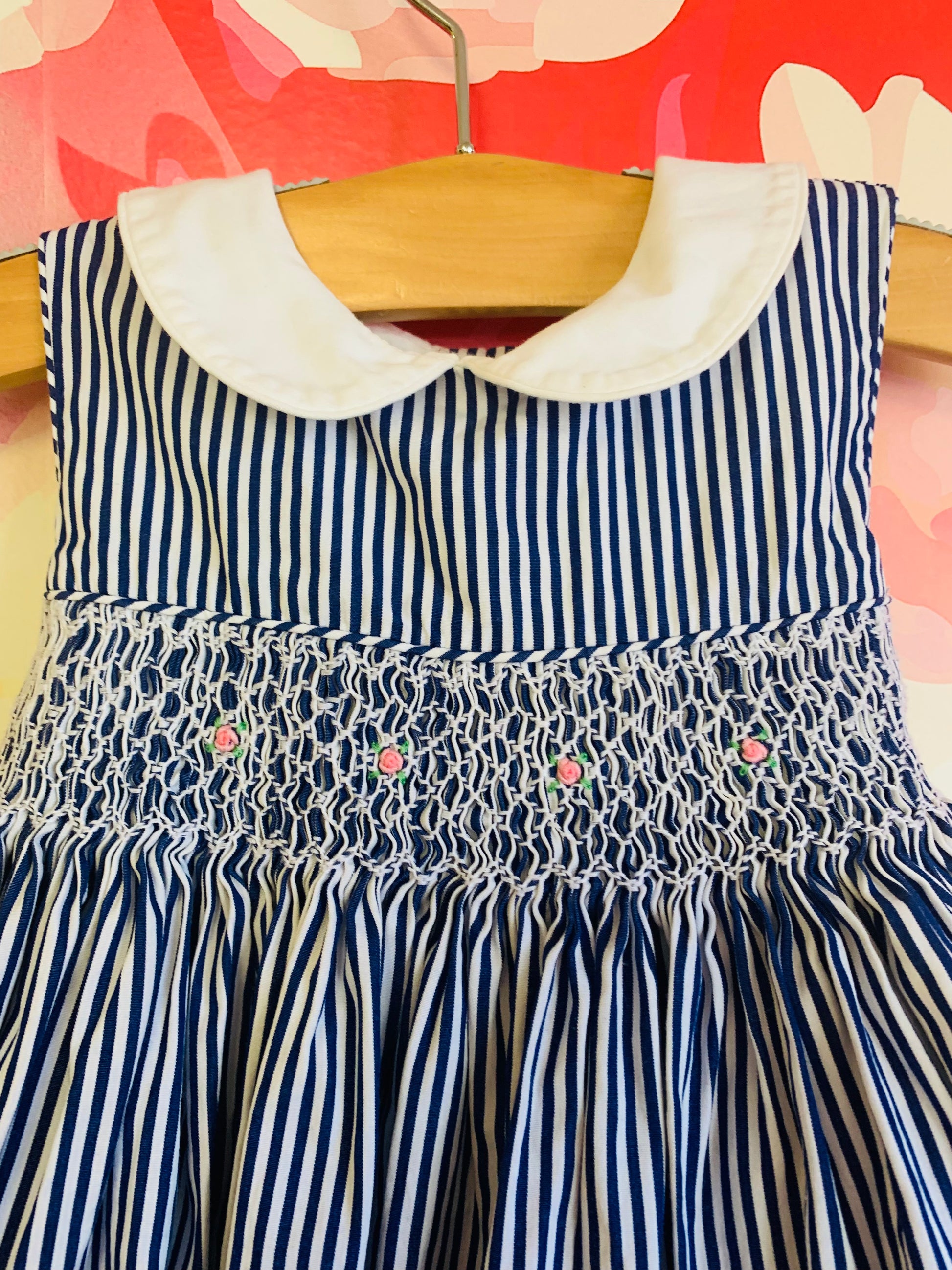 Ralph Lauren blue & White striped 100% cotton smocked dress. Full skirt, Peter Pan collar, waist bow tied in back. Size 18m