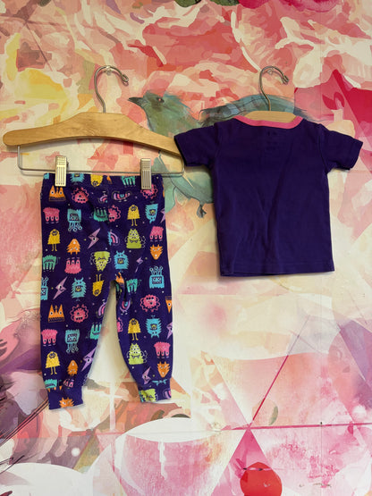 PJ PLACE short sleeve purple pajama set with Mommy’s Little Monster. Size 6-9m.