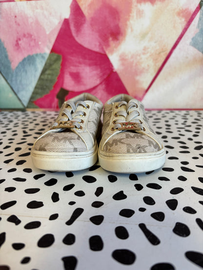 Michael Kors cream & beige sneakers with logo and no tie laces. Size 6.