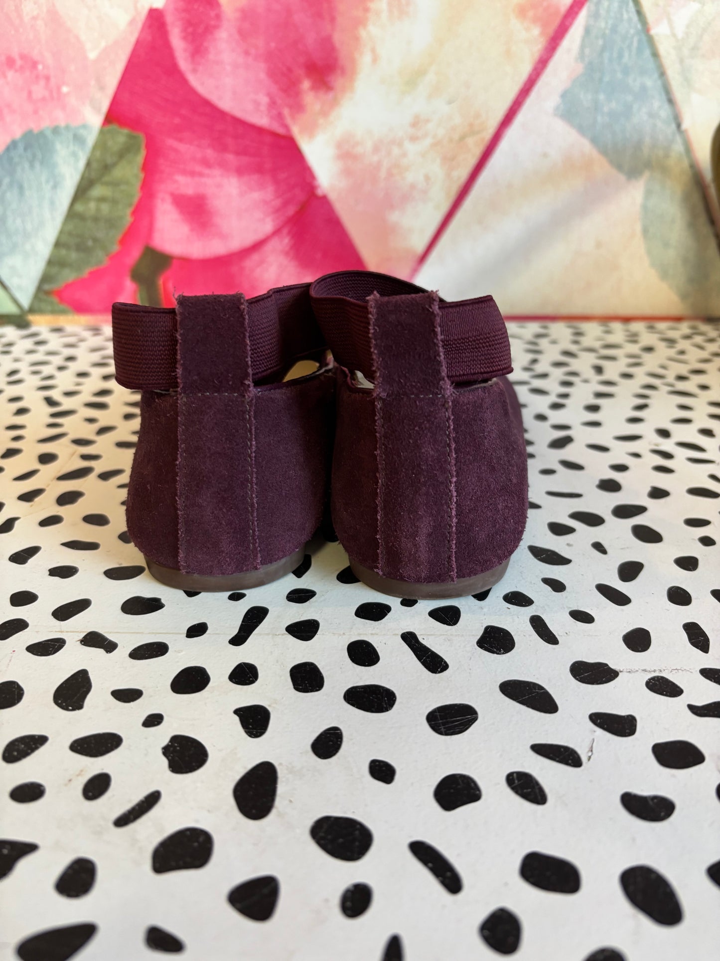 Elephantito purple suede leather Melissa flats. Luxe comfort ballerina shoe that features crossed stretch ankle straps for a secure fit. Lightly padded footbed leather outsole & lining. Size 3.