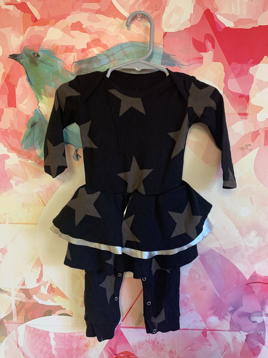 nununu black long sleeve romper with silver skirt and grey stars. Size 0-6m