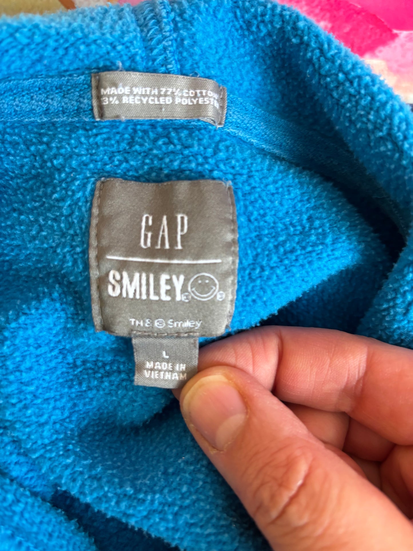 Gap blue hoodie with yellow smiley face. Size 14/16