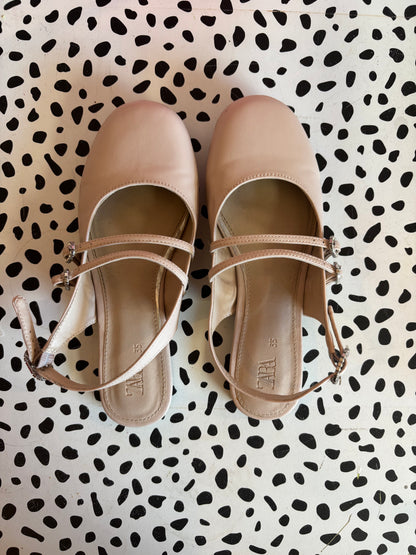 Zara pale pink dress flats with heel strap & two straps across foot. Rhinestone buckles. Size 3.