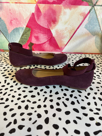 Elephantito purple suede leather Melissa flats. Luxe comfort ballerina shoe that features crossed stretch ankle straps for a secure fit. Lightly padded footbed leather outsole & lining. Size 3.