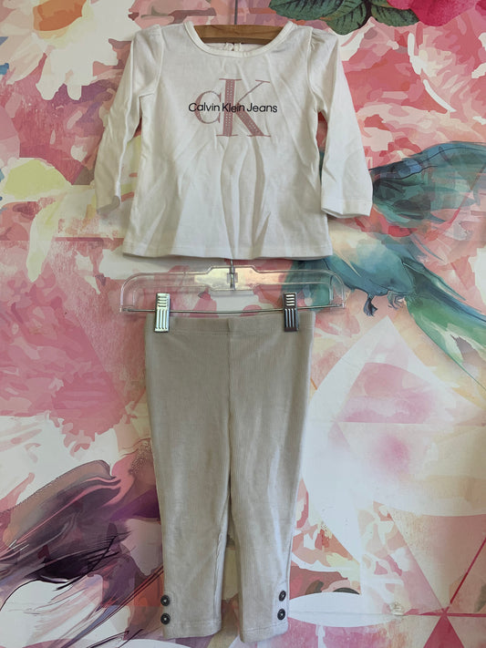 White Calvin Klein logo long sleeve top & natural velour ribbed CK leggings with buttons on ankles. Size 12m