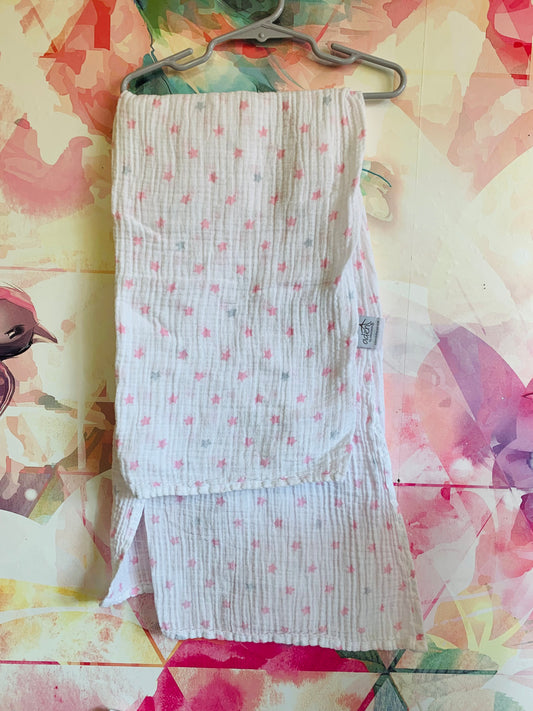 aden + anais white muslin blanket with pink & blue stars. 100% cotton.