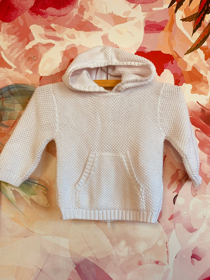 kissy kissy white knit pullover with hood, front pocket & back zipper. Size 6-9m.