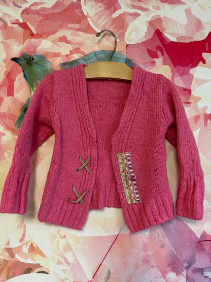 Peek pink open cardigan with gold sparkle design. Size 2/3T.