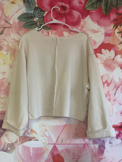 Urban Outfitters cream over-sized ribbed V-neck pullover. Adult Size Small.