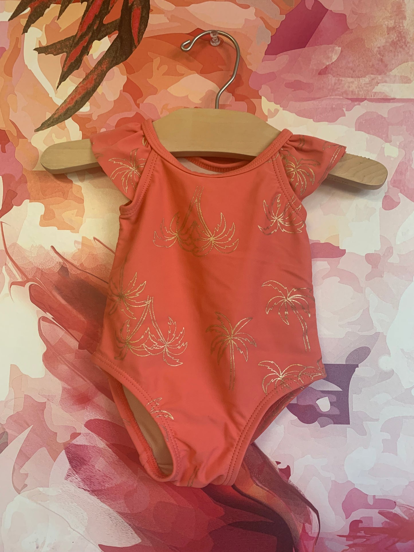 Tea Collection pink one piece swimsuit with gold palm trees. Size 3-6m