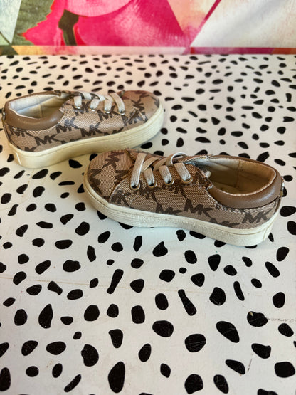 Michael Kors tan & cream slip on logo sneakers. Size 5.