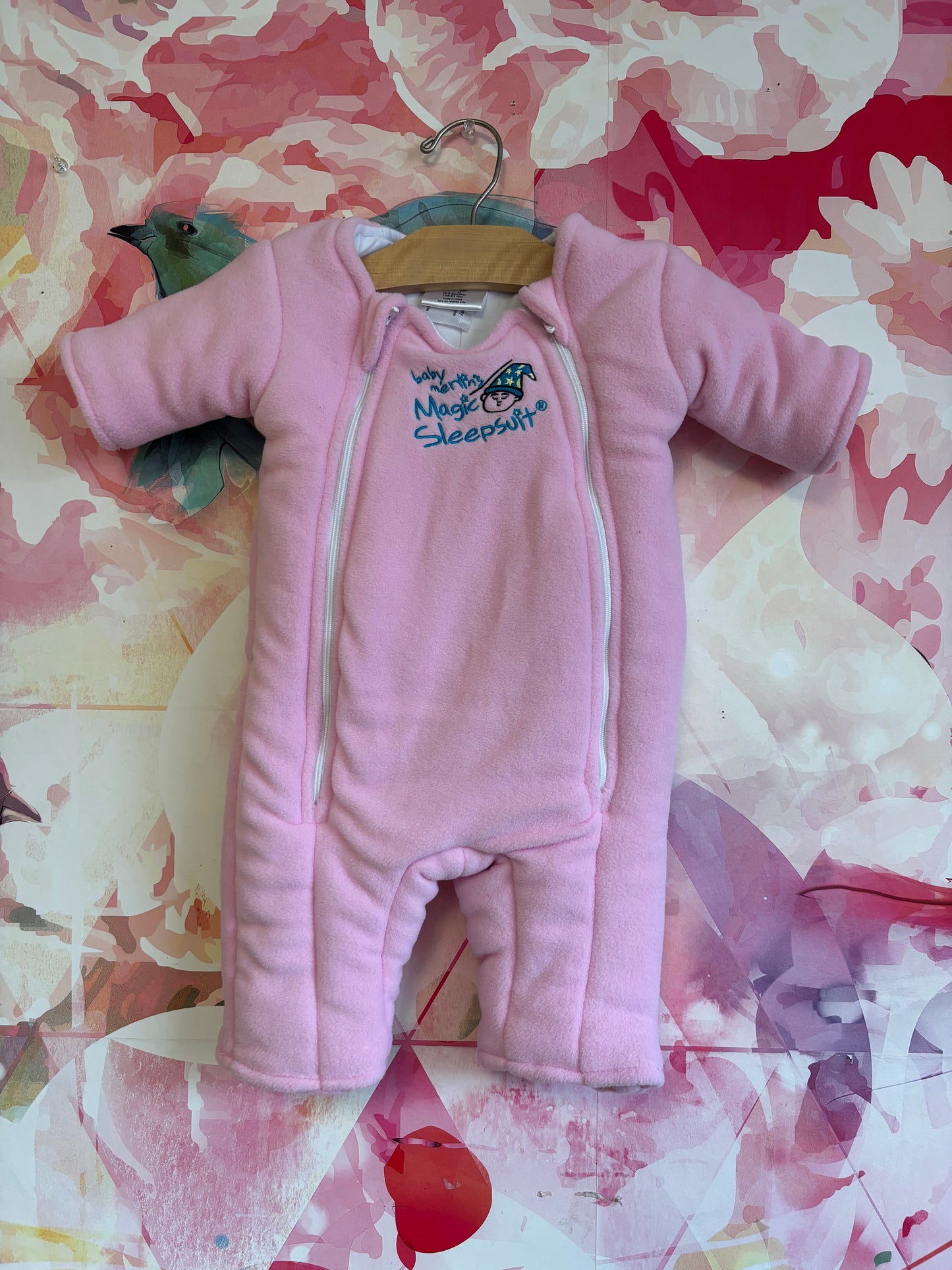 Baby Merlin’s Magic Sleepsuit in pink. Size Large 6-9m