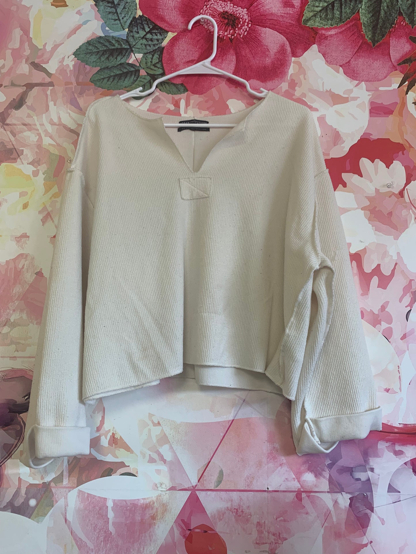 Urban Outfitters cream over-sized ribbed V-neck pullover. Adult Size Small.