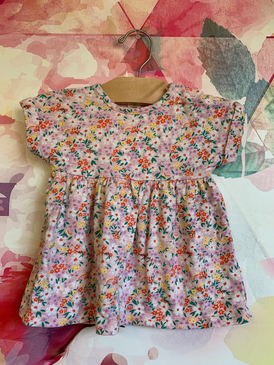 Tucker + Tate pink shirt sleeve dress with colorful flowers. 100% cotton. Shoulder snaps. Size 3m.