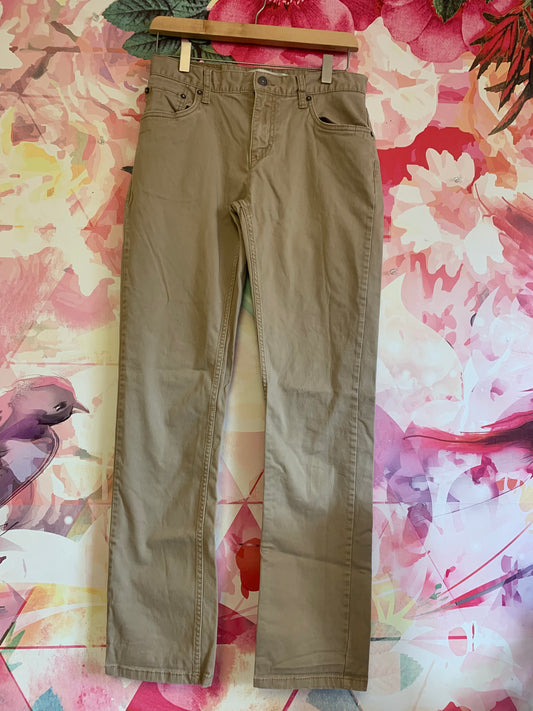 Levi’s slim fit khaki pants. Tiny stain on back left leg. See photo. Size 16.