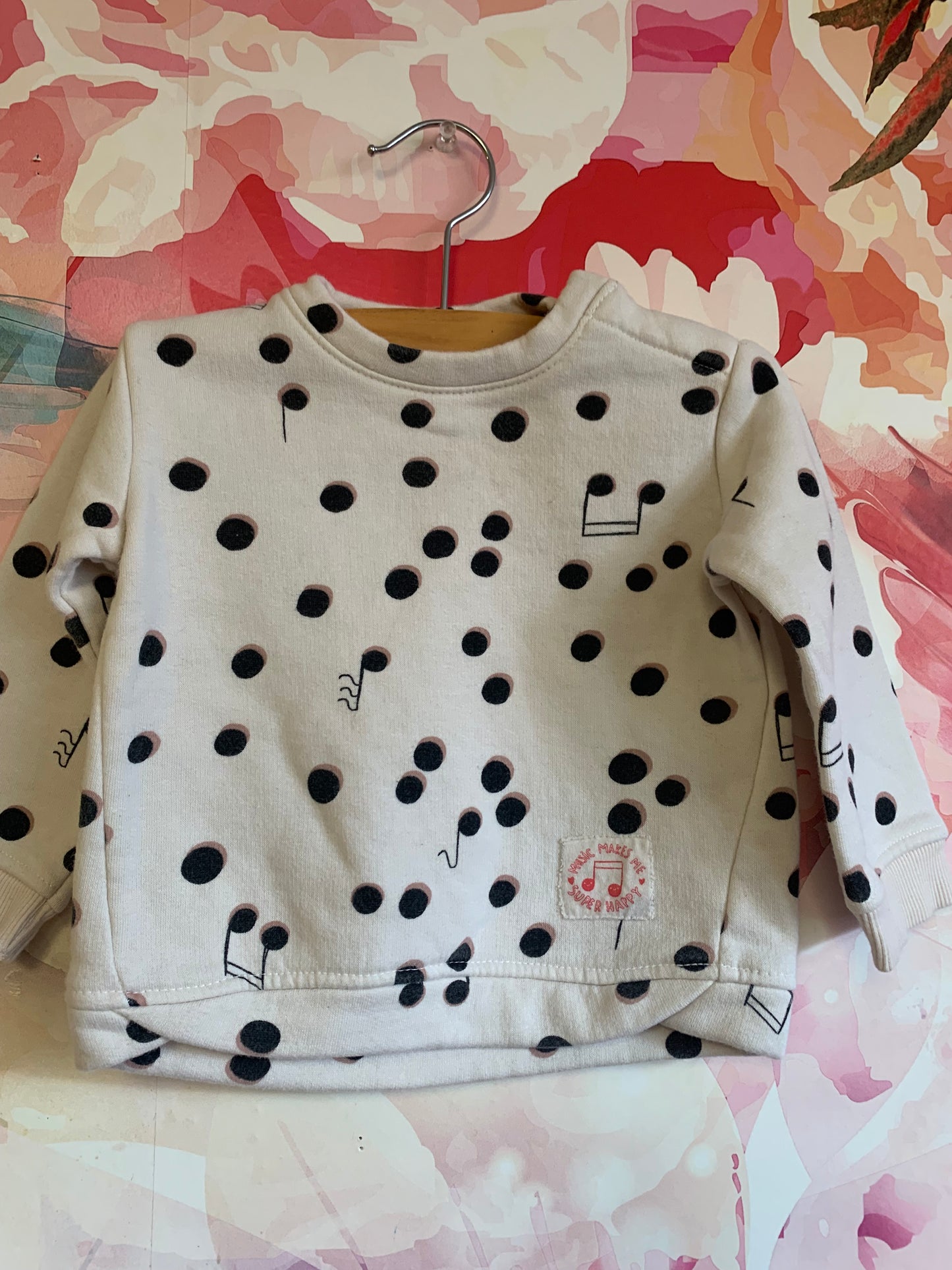 Zara cream sweatshirt with black & brown music notes & two shoulder snaps. Size 6-9m.