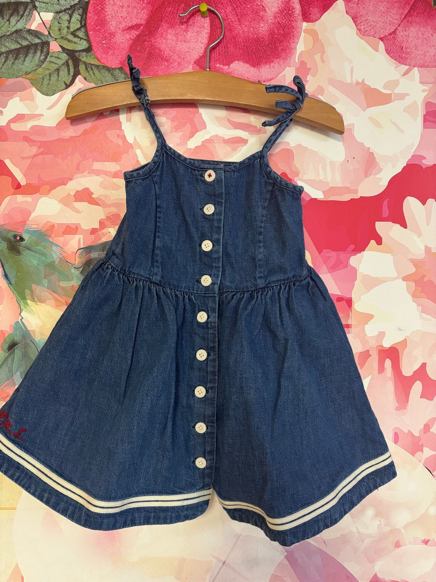 Polo Ralph Lauren blue denim spaghetti strap dress with full skirt, white buttons down front, two white stripes at hem and pockets. Size 3T