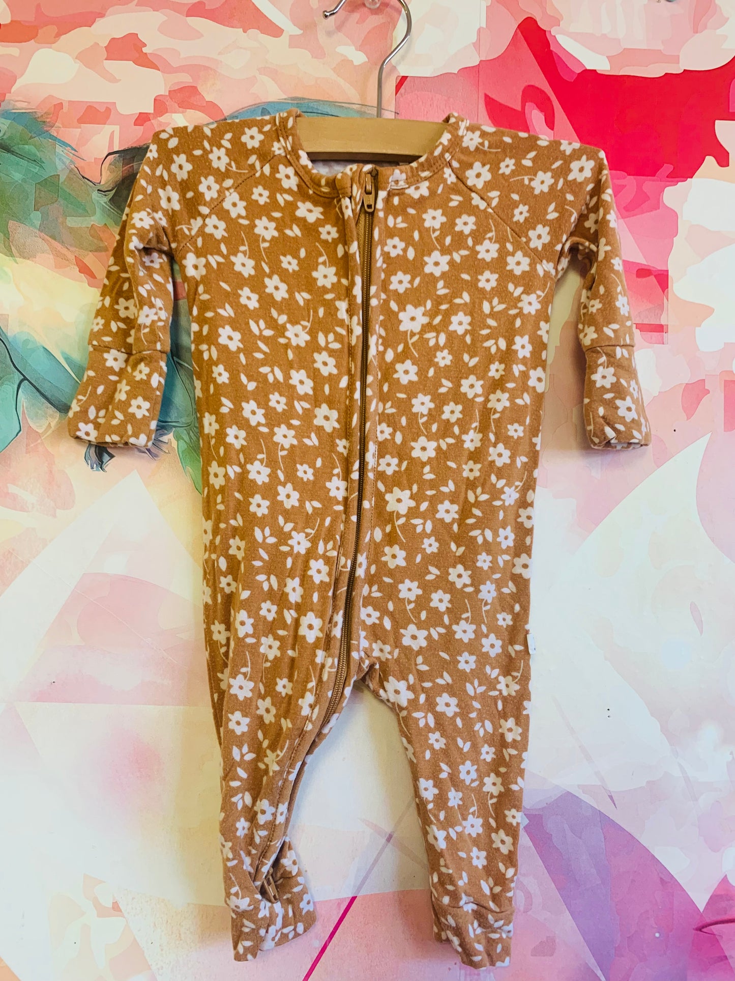 Brave Little Ones beige romper with white stars. Size 0-3m