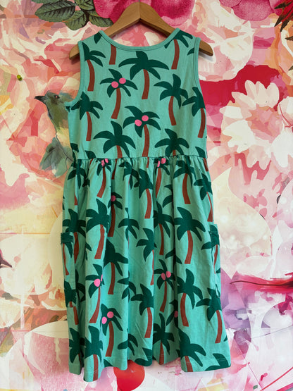 Green tank dress with palm trees, pink coconuts and front pockets. Size 12