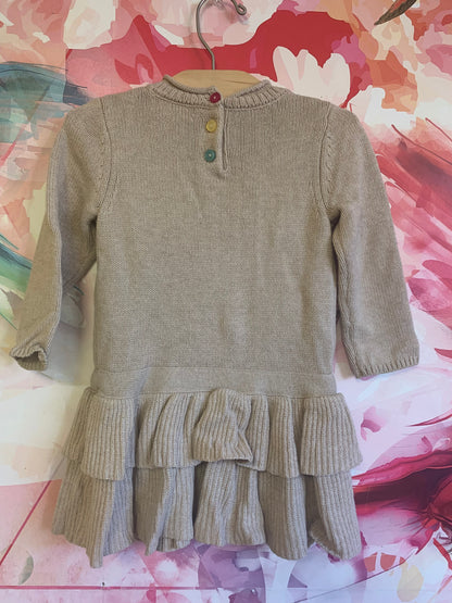 H&M Beige long sleeve knit dress with two tier ruffles and colorful Pom poms. Size 18m