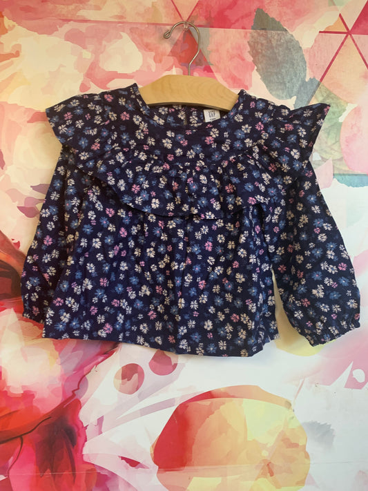 Gap navy blue long sleeve top with pink, white, blue flowers. Size 3T