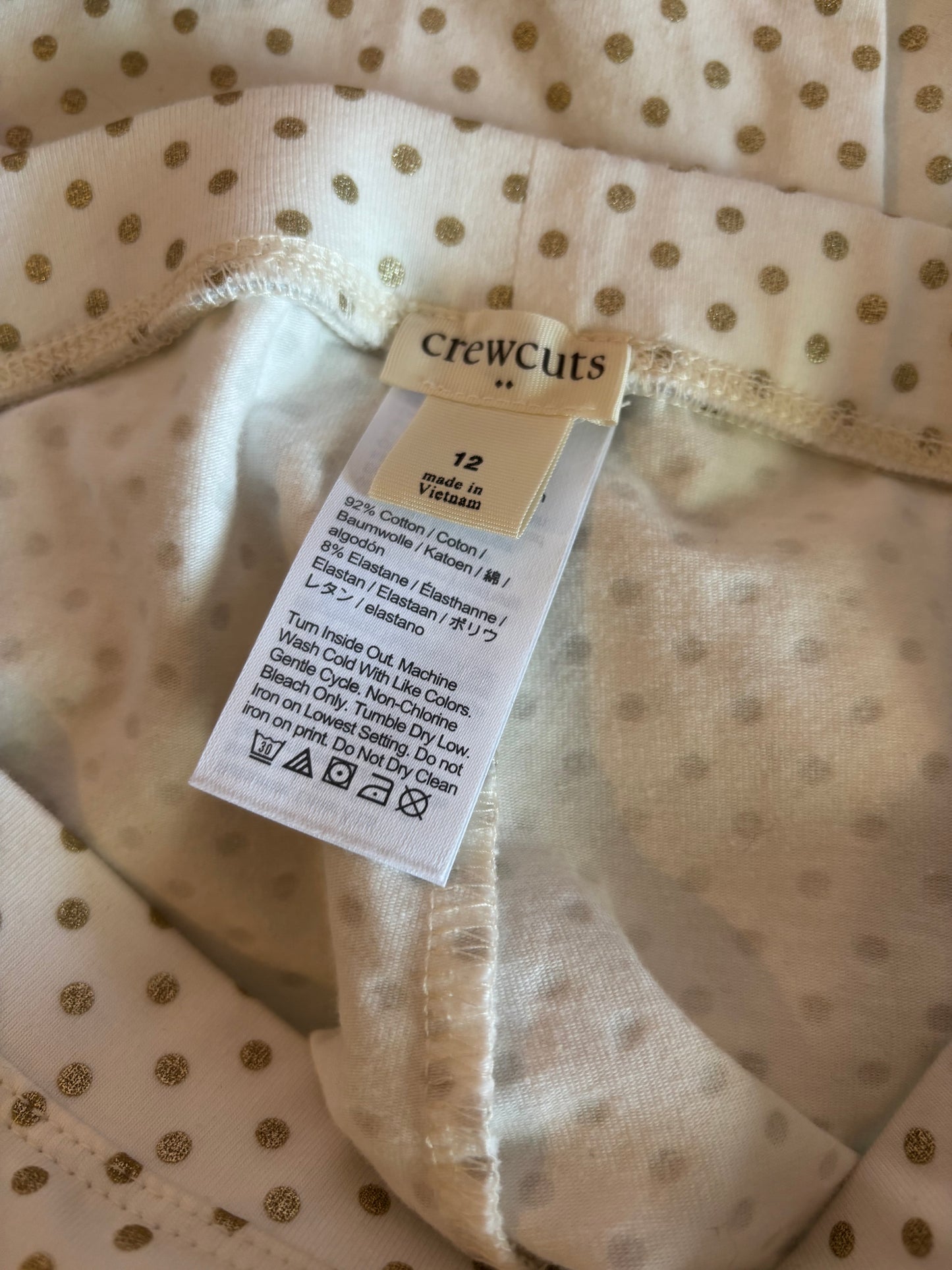 Crewcuts white leggings with gold polka dots. Size 12.