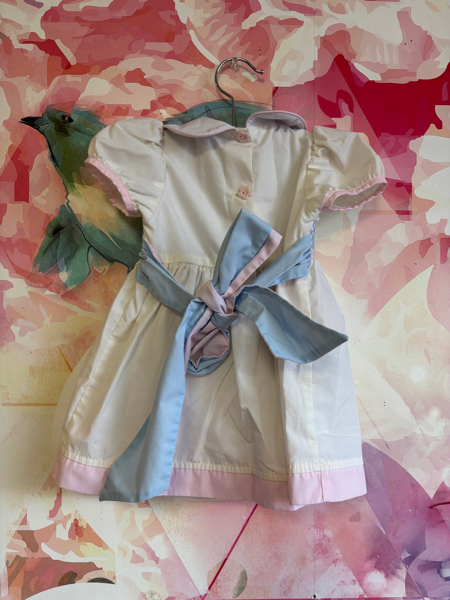 The Beaufort Bonnet Company white short sleeve dress. Blue & pink bow and pink hem. Size 6-12m