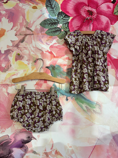 Milk barn purple, cream & green flowery short sleeve top & shorts. Size 12-18m