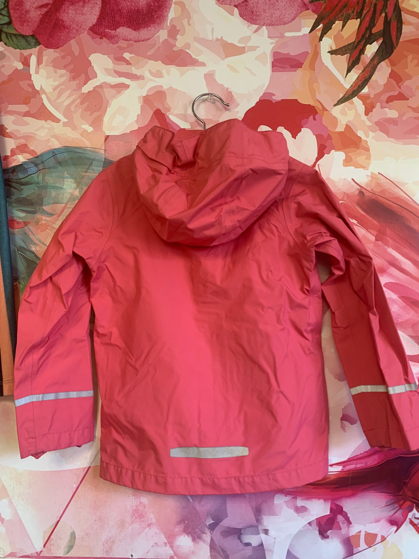 Patagonia pink raincoat with hood and reflective stripes. Size 4T.