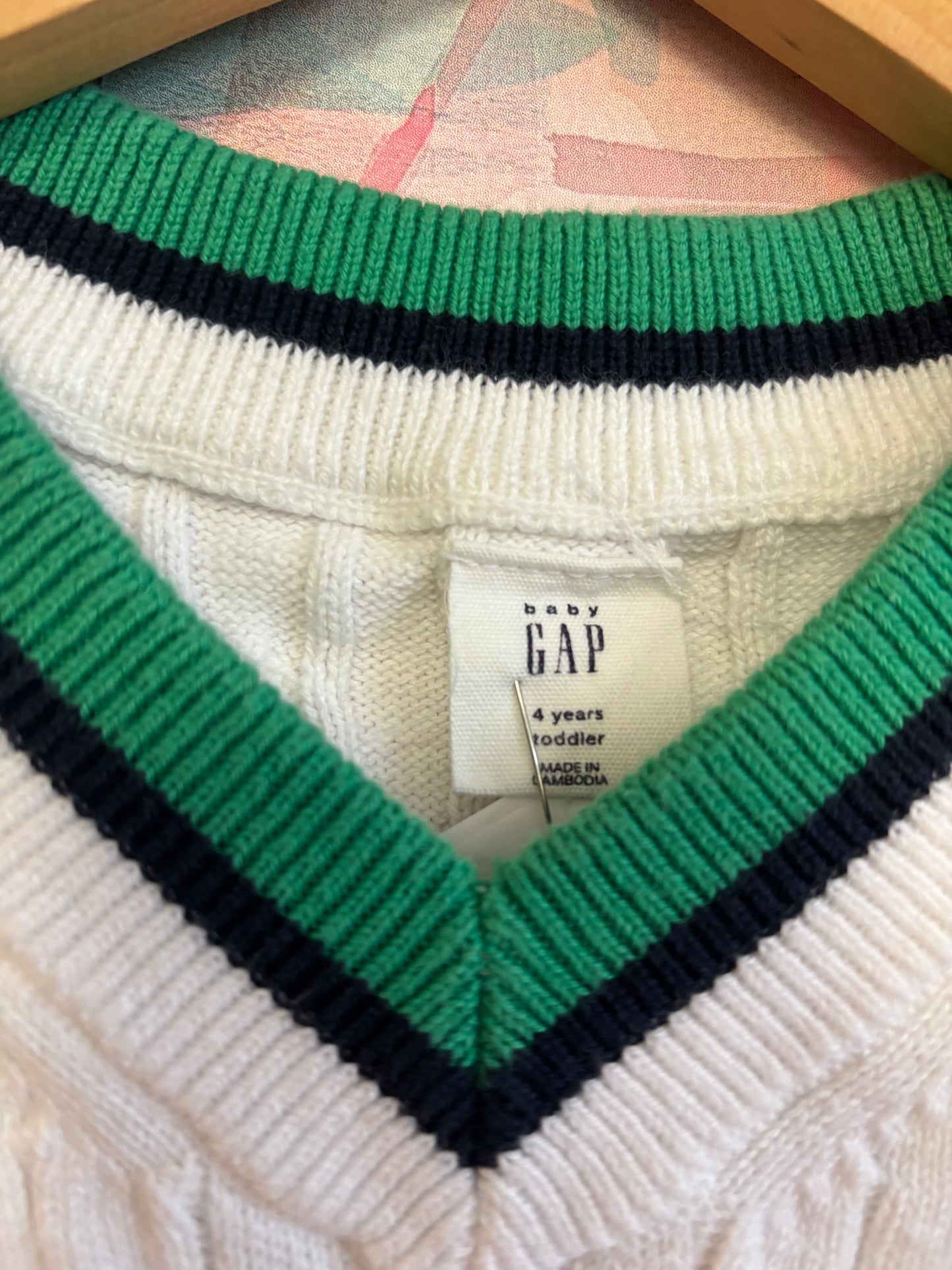 Baby Gap white knit vest with blue/green stripe on neck. Size 4T.