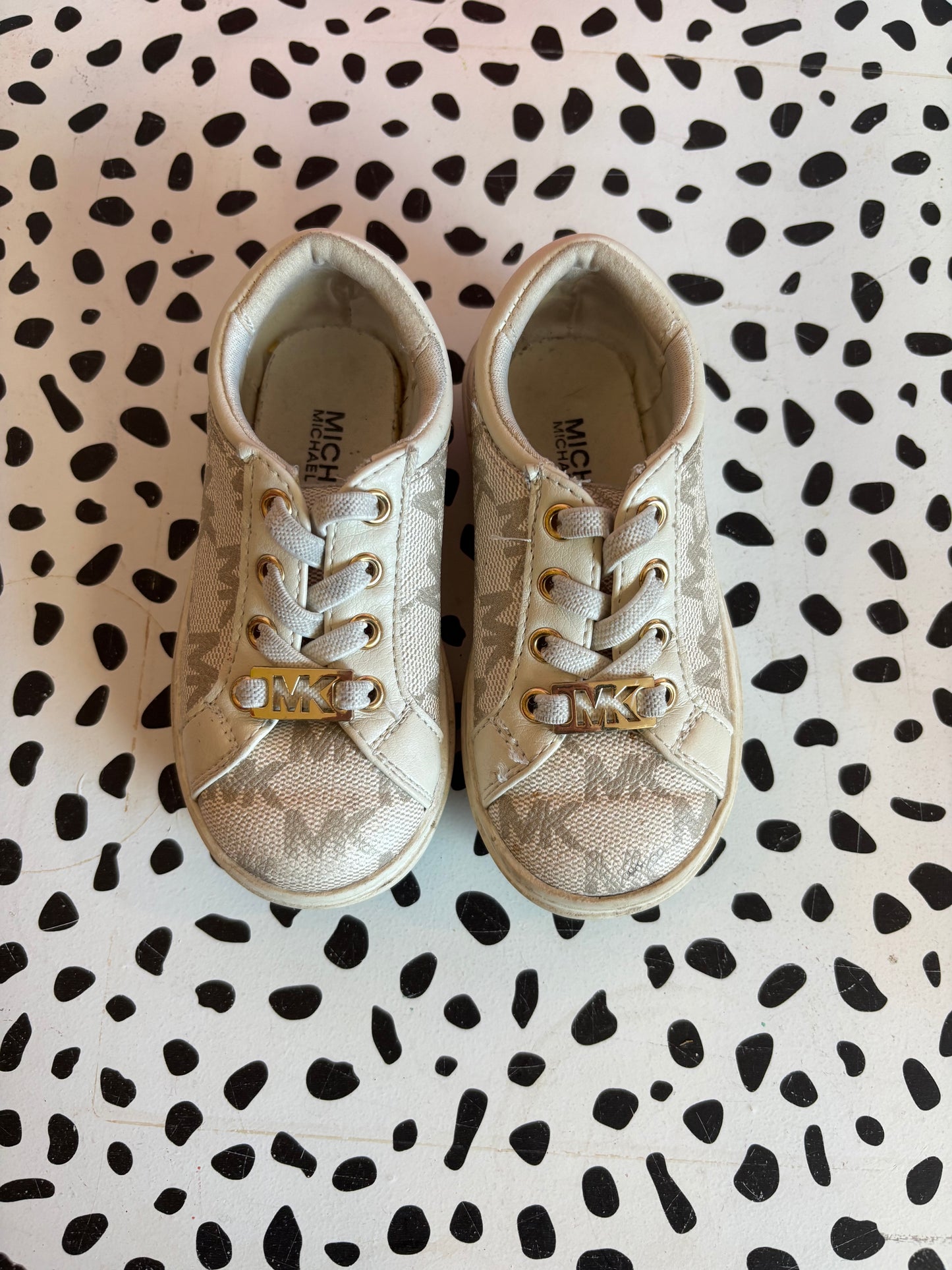 Michael Kors cream & beige sneakers with logo and no tie laces. Size 6.