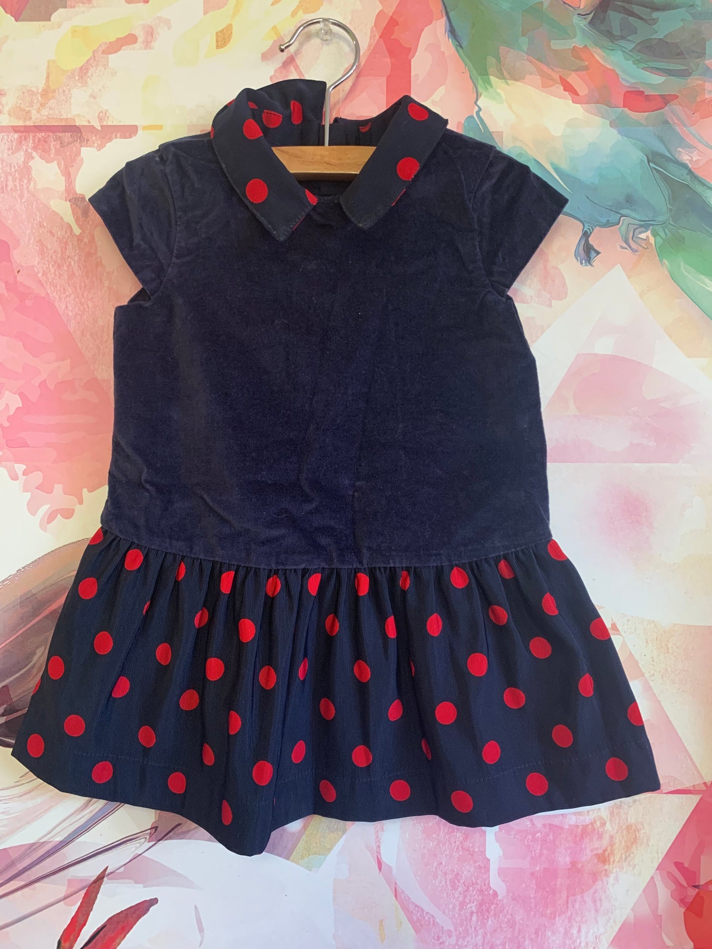 Short sleeve blue velvet dress with red polka dot collar & skirt. Size 18-24m