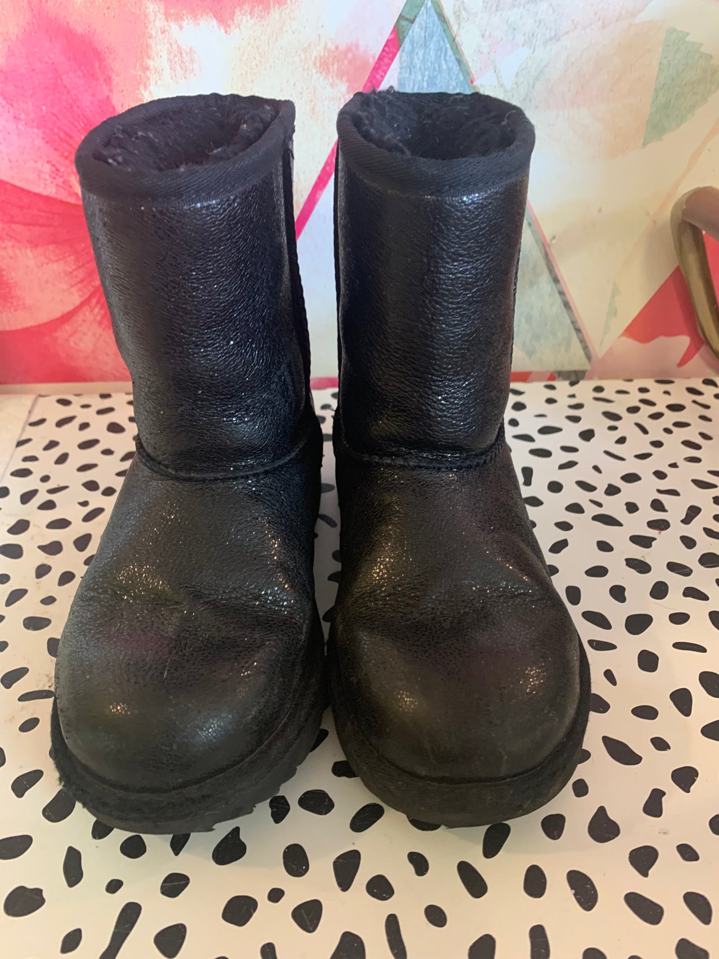 Ugg black shimmery fur lined boots. Slip on. Size 2.