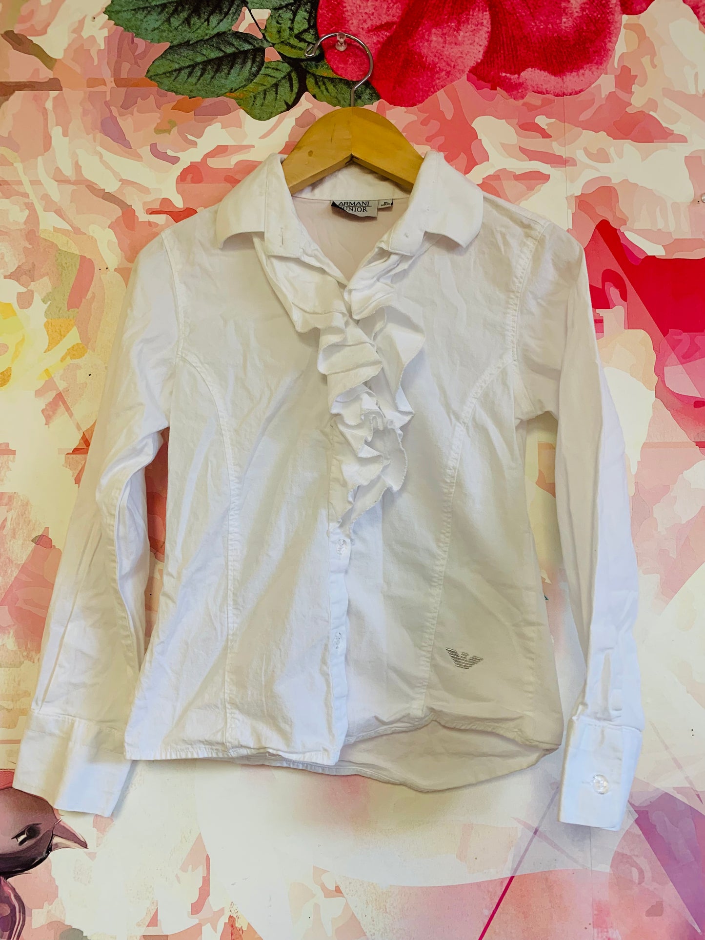 Armani Junior white button down cotton collared blouse with ruffle along clear buttons. Extra button attached - see pics. Size 8.