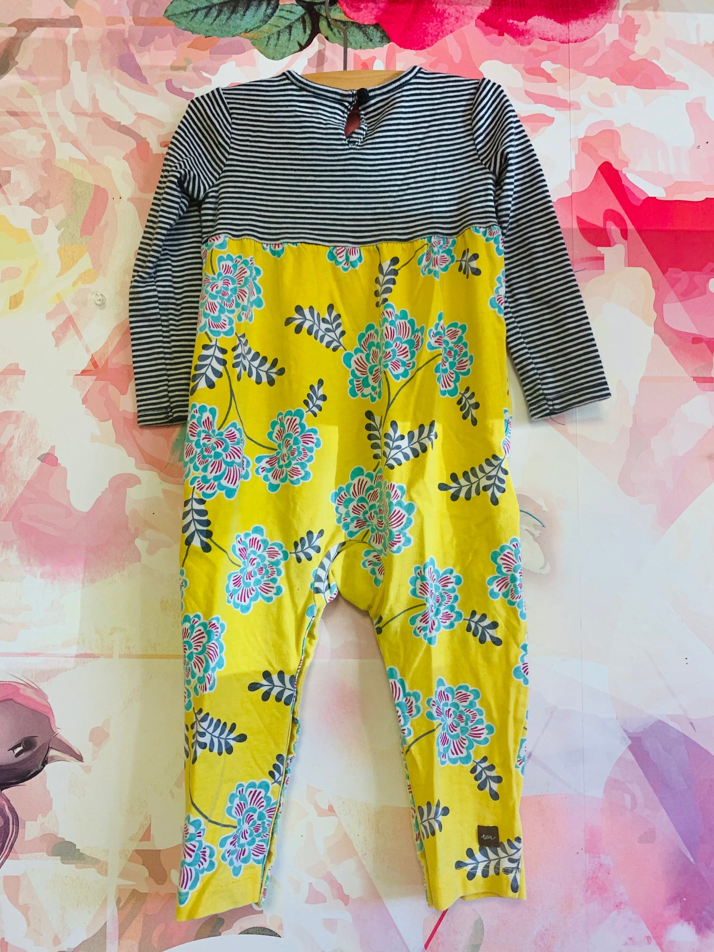 Tea Collection romper. Black & white stripes and yellow with green/red flowers. Size 12-18m