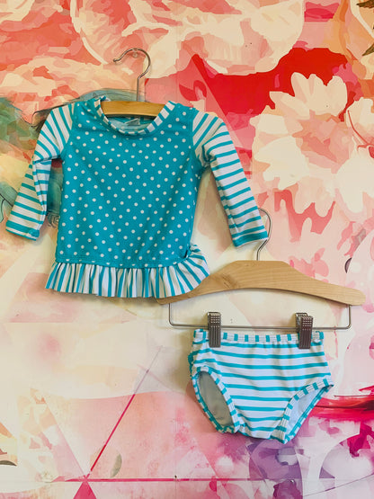 Ruffle Butts blue & white stripe and polka dot two piece swimsuit. Size 6-12m