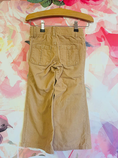 Baby Gap beige bell bottom corduroy pants. Two buttons and zipper with front pockets and belt loops. Size 4T