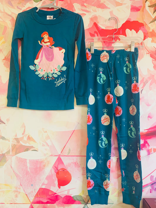 Hanna Andersson/Disney blue long sleeve pj set. *New With Tags*. Ariel in purple dress on shirt, ornaments on pants. Size 5T