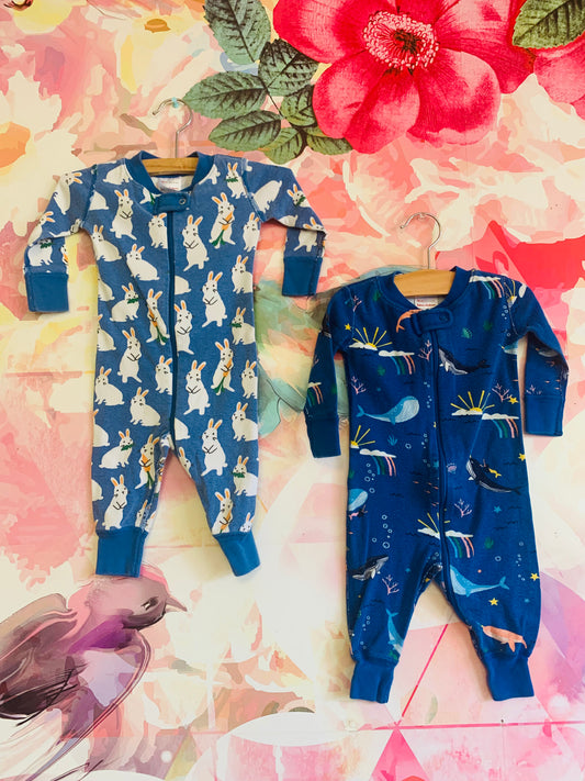 Two Hanna Andersson blue long sleeve rompers. Bunnies & carrots and orca, whales, mermaids, rainbows. Size3-6m.