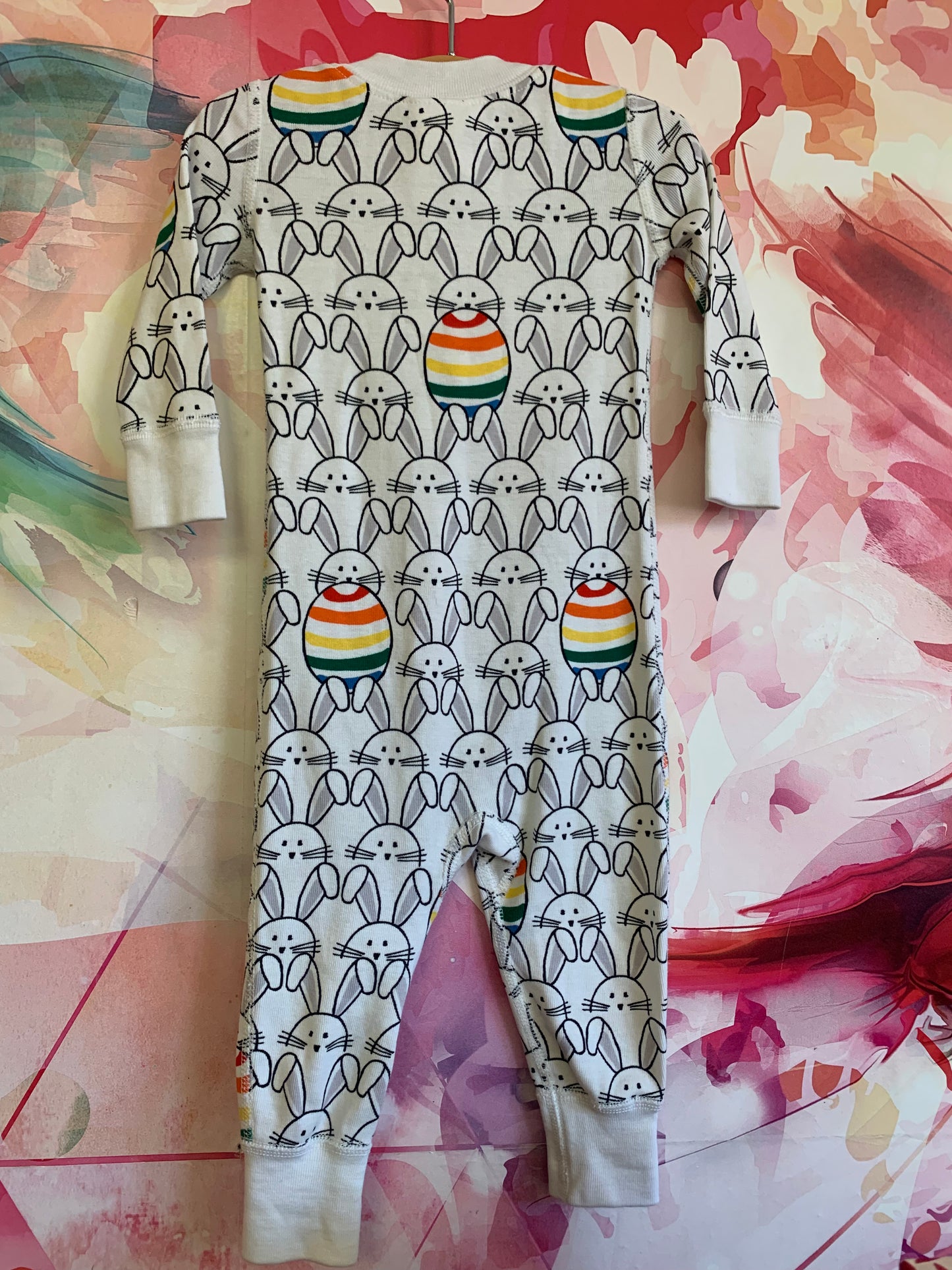 Hanna Andersson long sleeve bunny romper with rainbow stripe eggs. Size 6-12m.