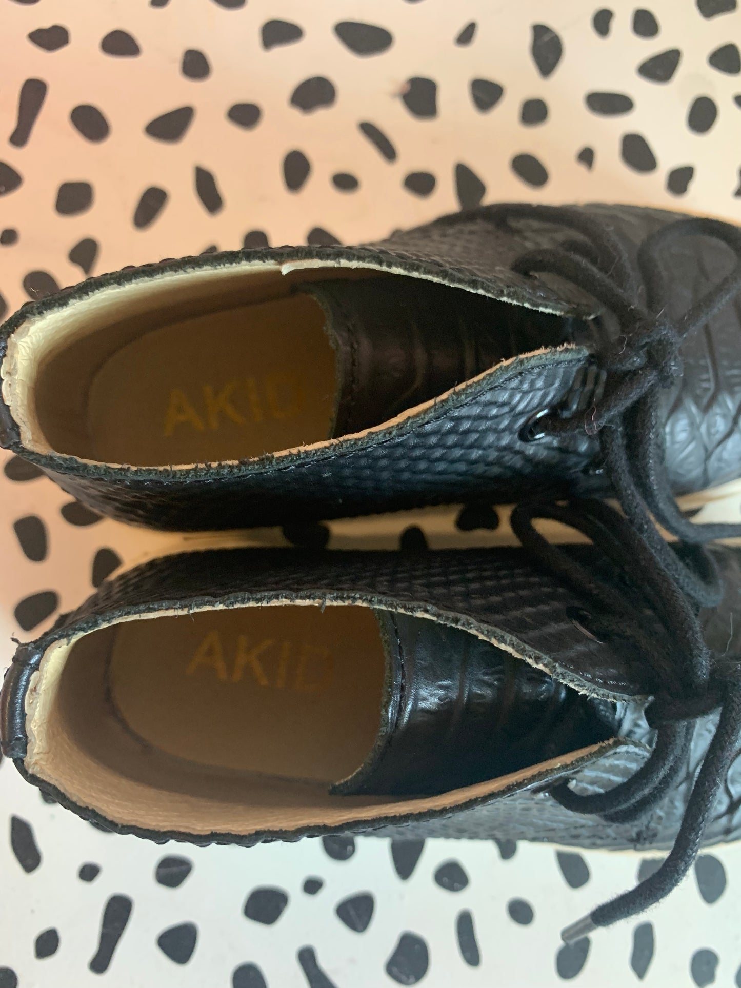 Akid black snake embossed leather high top sneakers. Size 10