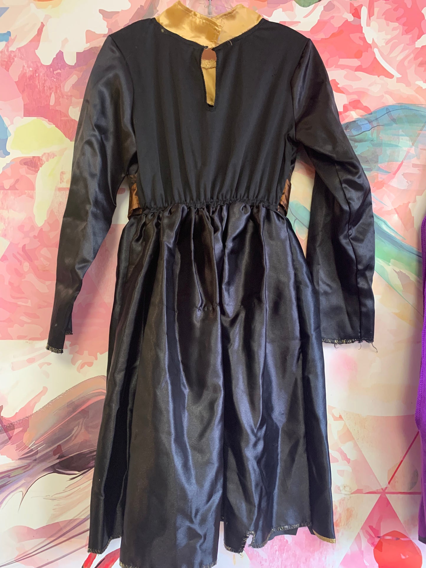 Disney dress up costume. Black, brown, gold long sleeve dress with purple cape. Size 6T.