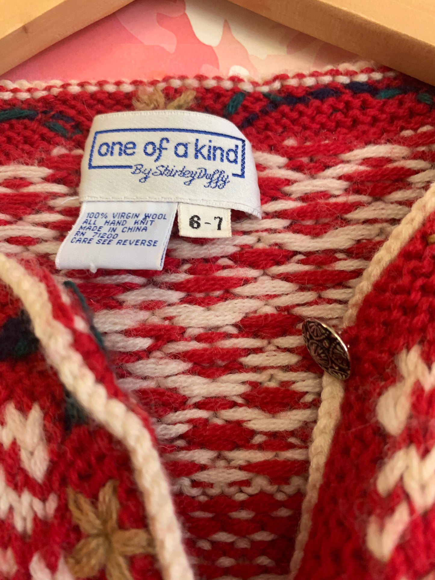 One of a Kind by Shirley Duffy hand knit 100% virgin wool cardigan. Red, white, blue, green with round metal buttons. *one button missing. See closeup pic*. Size 6/7