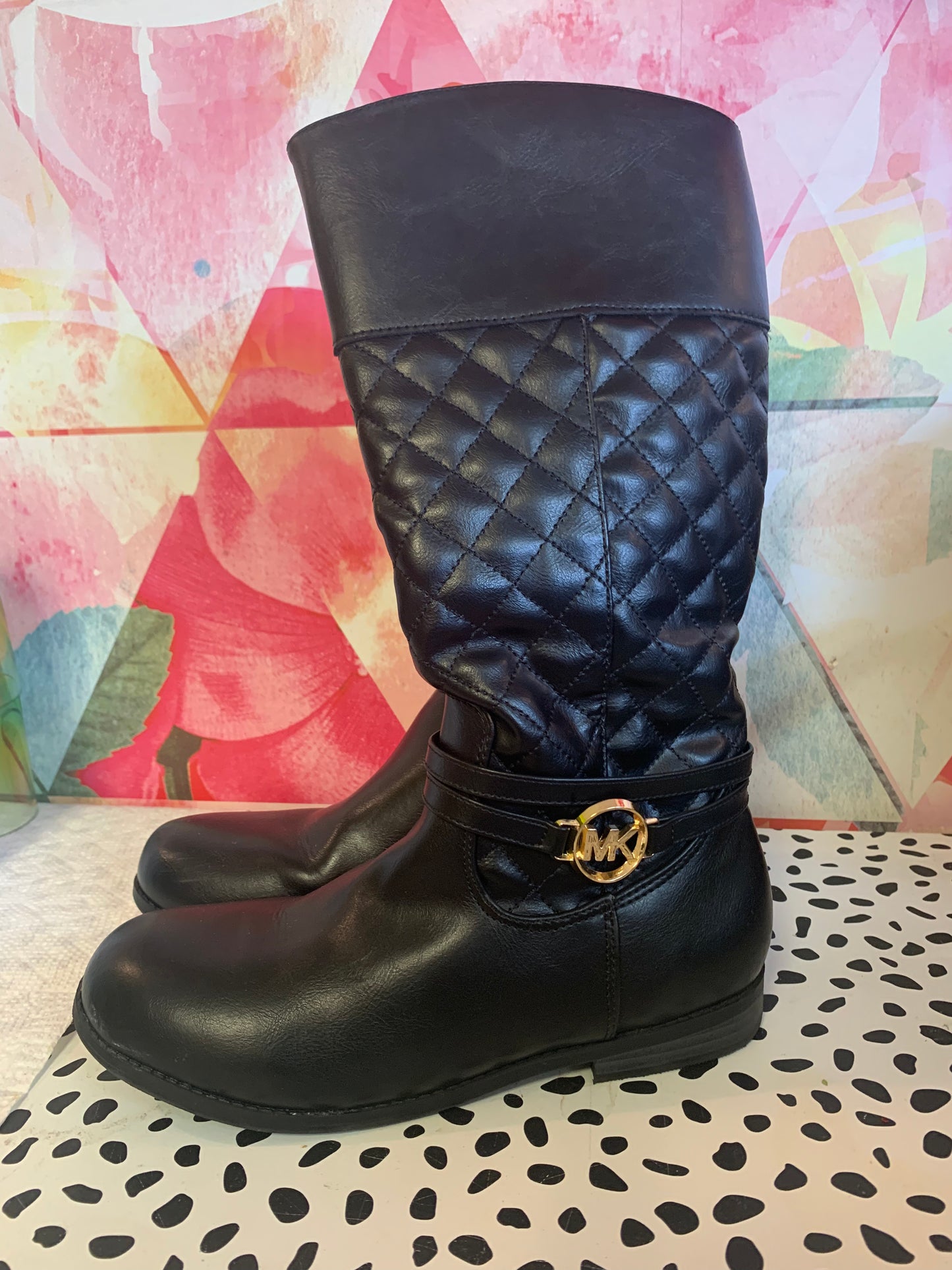 MK Michael Kors black tall zip up boots with quilting and gold detail. *Like New Condition* size 5.