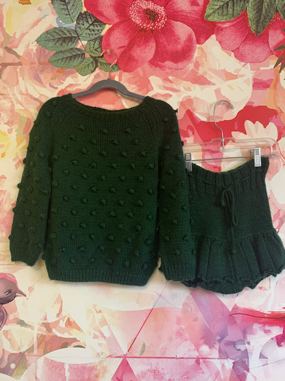 Misha & Puff emerald green knit sweater and skort. Puffy knit balls on sweater and waist tie on skort. Size 4/5.