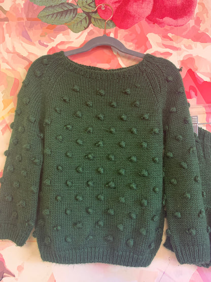 Misha & Puff emerald green knit sweater and skort. Puffy knit balls on sweater and waist tie on skort. Size 4/5.