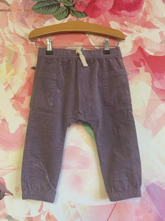 Cotton On Baby purple velour pants with elastic waist & ankles. Front pockets. Size 18-24m