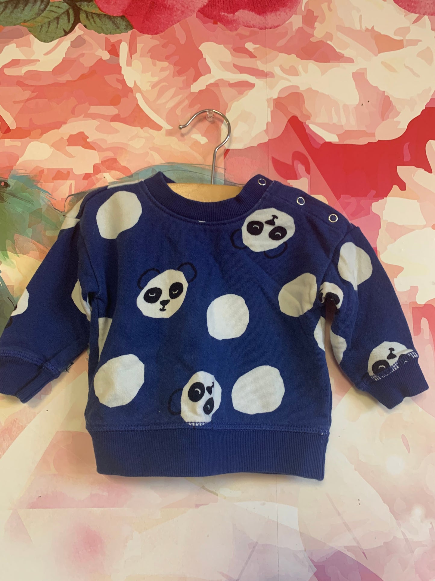 Hanna Andersson blue sweatshirt with black & white panda faces. Shoulder snaps. Size 3-6m