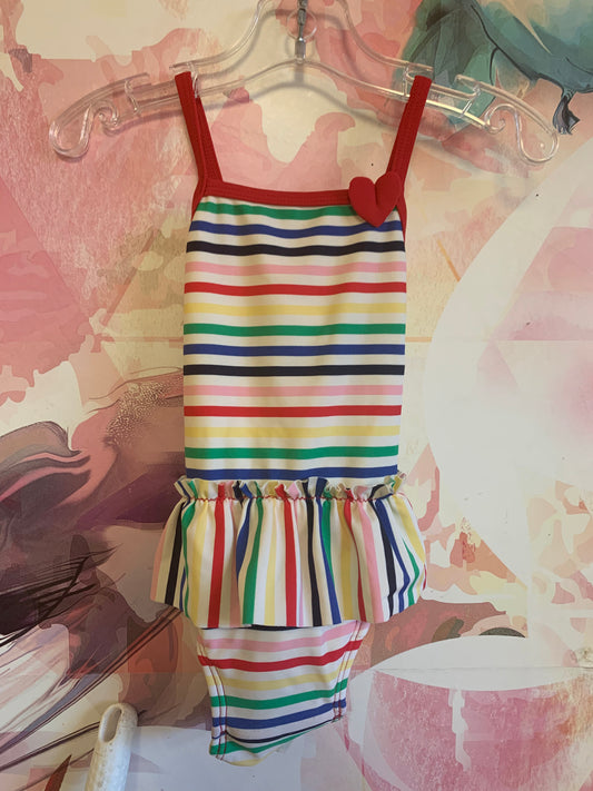 Hanna Andersson rainbow stripe one piece swimsuit with skirt. Criss cross straps on back. Size 6m